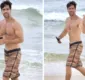 
                  Marcos Pitombo exibe abdômen trincado em praia do Rio de Janeiro