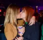 
                  Titi Müller curte show em clima de intimidade com a namorada; FOTOS