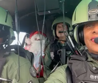 Orfanato onde Glória Maria fez adoção recebe Papai Noel em helicóptero