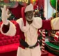 
                  Papai Noel negro presenteia crianças com representatividade na Bahia