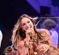 
                  MP recebe denúncia contra Claudia Leitte após polêmica com música