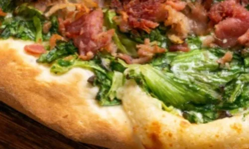 
				
					Aprenda a fazer uma pizza caseira de escarola com 7 ingredientes
				
				