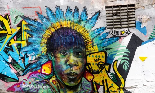  				 					Spray Cabuloso muda cenário urbano com pinturas que exaltam o negro 				 				