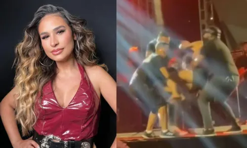 
				
					Fã de Simone Mendes sobe em palco e é expulsa por seguranças; VÍDEO
				
				