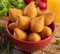 Petiscos: aprenda a fazer coxinha prática em 60 minutos