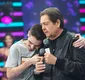 
                  Filho de Faustão abre baú e imita vídeos nostálgicos do pai; assista