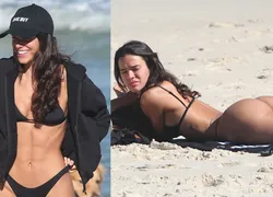 Bruna Marquezine é flagrada com bumbum para cima na praia; FOTOS