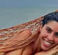 
                  Bela Gil causa alvoroço ao surgir de topless em praia; veja foto
