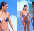 Juliana Paes exibe corpão em dia de praia com o marido; FOTOS
