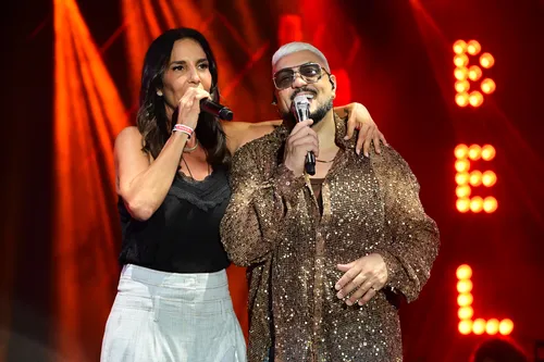 
					Ivete Sangalo é flagrada aos beijos com Tiago Maia em show de Belo
				
				