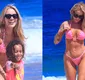 
                  Karoline Lima combina biquíni com a filha e exibe boa forma; FOTOS