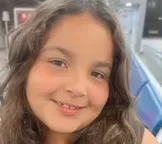 Menina de 9 anos morre após acidente entre motocicleta e caçamba