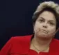 
                  Posso sentir na boca o gosto amargo da injustiça, diz Dilma