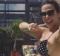 
                  Carla Perez exibe barriga chapada ao posar de biquíni em Orlando