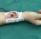 
                  Orelha 'cultivada' em braço de paciente é implantada na cabeça
