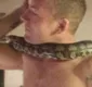 
                  Criador de píton é encontrado estrangulado ao lado de cobra