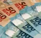 
                  Governo reduz estimativa e salário mínimo deve ficar em R$ 965