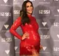 
                  Ivete Sangalo mostra barriguinha em vestido vermelho