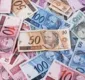 
                  Bolsonaro assina decreto que fixa salário mínimo em R$ 998