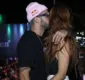 
                  No dia do show de Anitta, Pedro Scooby troca beijos com modelo