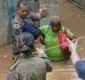 
                  Sobe para 52 o número de mortos pelas chuvas em MG