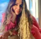 
                  Viviane Araújo exibe abdômen trincado e impressiona web