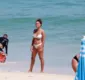 
                  Filha de Carlinhos Brown esbanja beleza em praia do RJ
