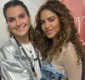 
                  Namorada de Lucy Alves acompanha show da cantora no Rock in Rio coladinha ao palco