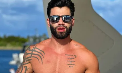 
				
					Gusttavo Lima chama atenção com volume em foto de sunga na web: 'A caxumba tá diferente'
				
				