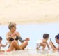 
                  De biquíni, Lan Lanh curte momentos com os filhos na praia; veja fotos