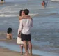 
                  Luciana Gimenez curte praia e dá beijão em namorado em Trancoso