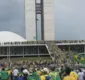 
                  Bolsonaristas ultrapassam bloqueio e invadem Congresso Nacional, em Brasília