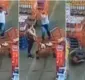 
                  Homem arremessa carrinho de compras contra mulher em supermercado; imagens impressionam